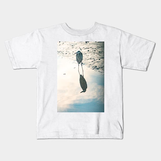 reflections of a blue heron Kids T-Shirt by KensLensDesigns